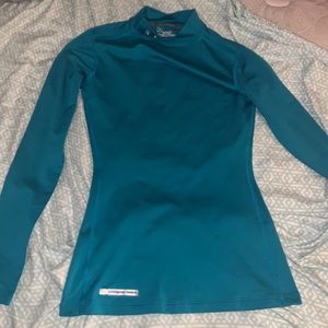 hardly worn. XS. under aumor. turquoise no rips or blemishes